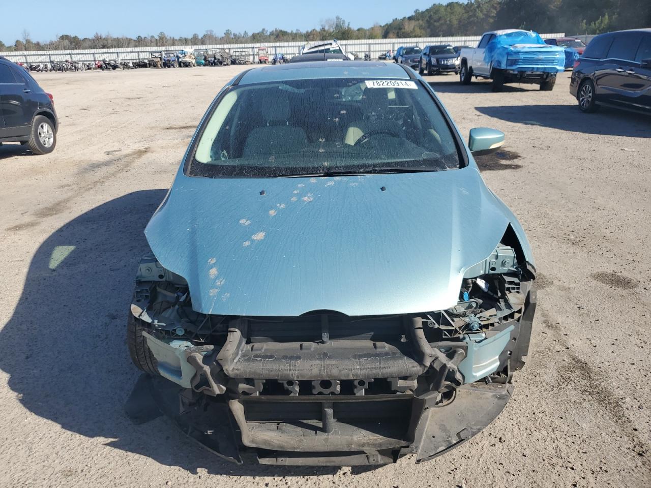 2012 Ford Focus VIN 1FAHP3M20CL232585 Copart auction photo, side / front end damage thumbnail 5