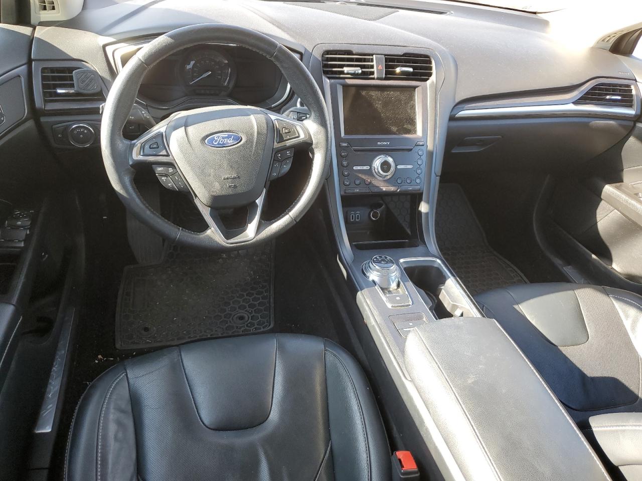 2019 Ford Fusion VIN 3FA6P0SU7KR145552 Copart auction photo, burn - interior damage thumbnail 8
