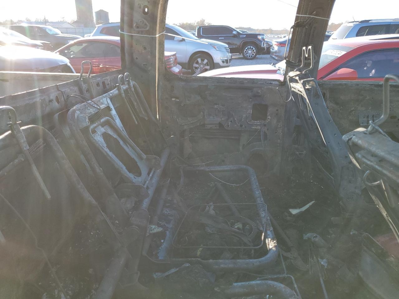 2012 Chevrolet Silverado VIN 3GCPKTE22CG269606 Copart auction photo, burn damage thumbnail 11