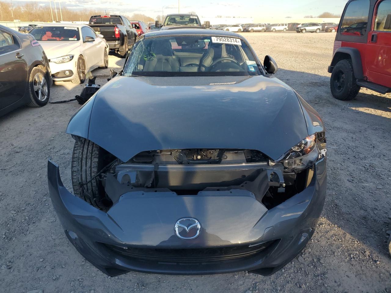 2021 Mazda MX-5 VIN JM1NDAM75M0452605 Copart auction photo, side / front end damage thumbnail 5