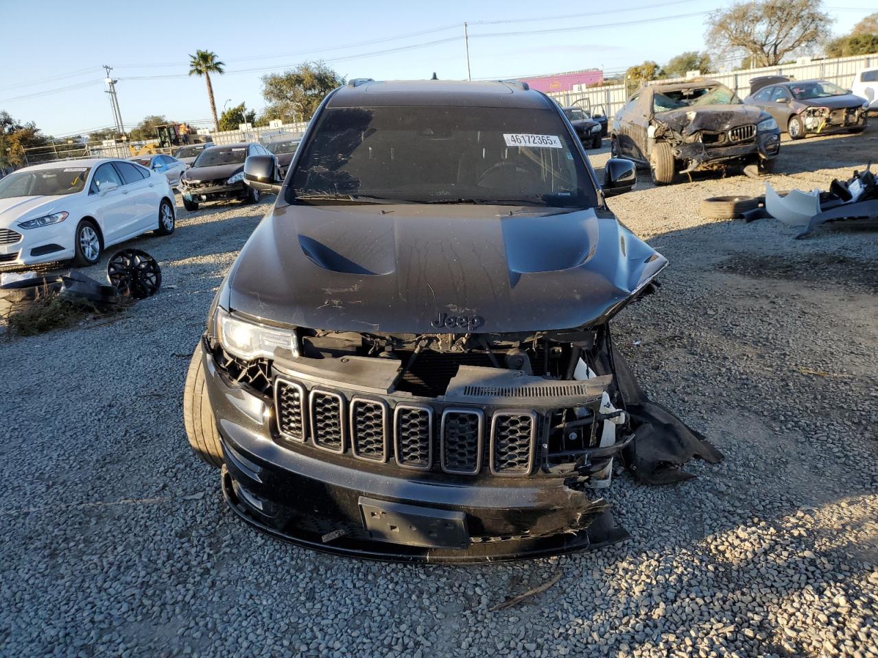2021 Jeep Grand Cherokee VIN 1C4RJFBG4MC726997 Copart auction photo, front end / side damage thumbnail 5