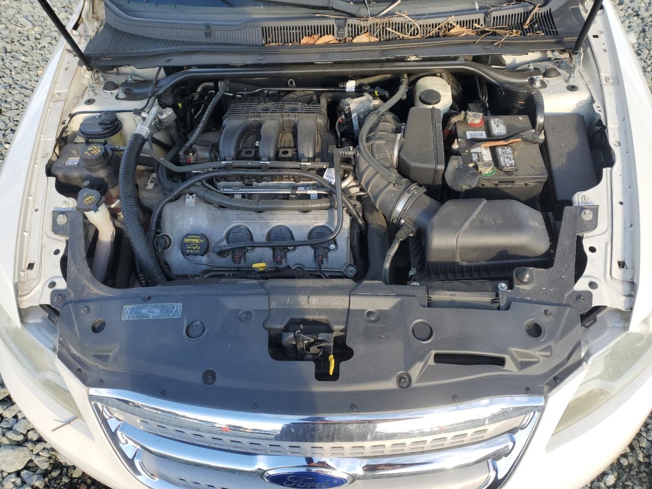 2012 Ford Taurus VIN 1FAHP2EW0CG111995 Copart auction photo, front end / undercarriage damage thumbnail 11