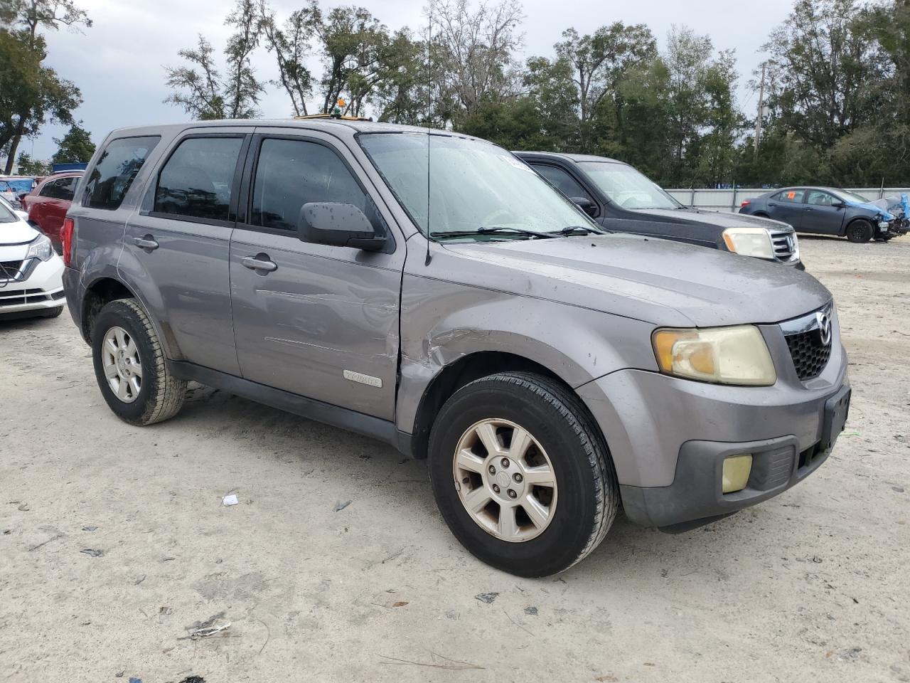 2008 Mazda Tribute VIN 4F2CZ06158KM19304 Copart auction photo, front end / side damage thumbnail 4