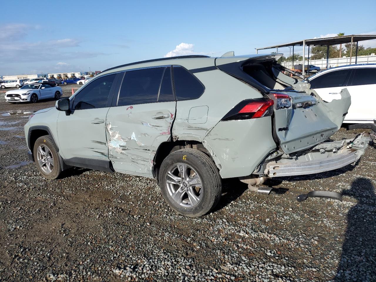 2022 Toyota RAV 4 VIN 2T3W1RFV9NW193038 Copart auction photo, rear end / side damage thumbnail 2