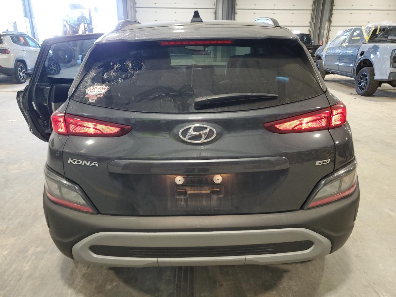 2022 Hyundai Kona VIN KM8K6CAB3NU911654 Copart auction photo, side / rear end damage thumbnail 6