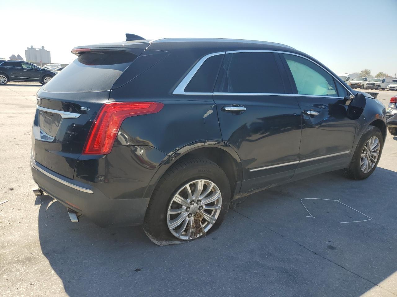 2017 Cadillac XT5 VIN 1GYKNARS6HZ251367 Copart auction photo, side damage thumbnail 3