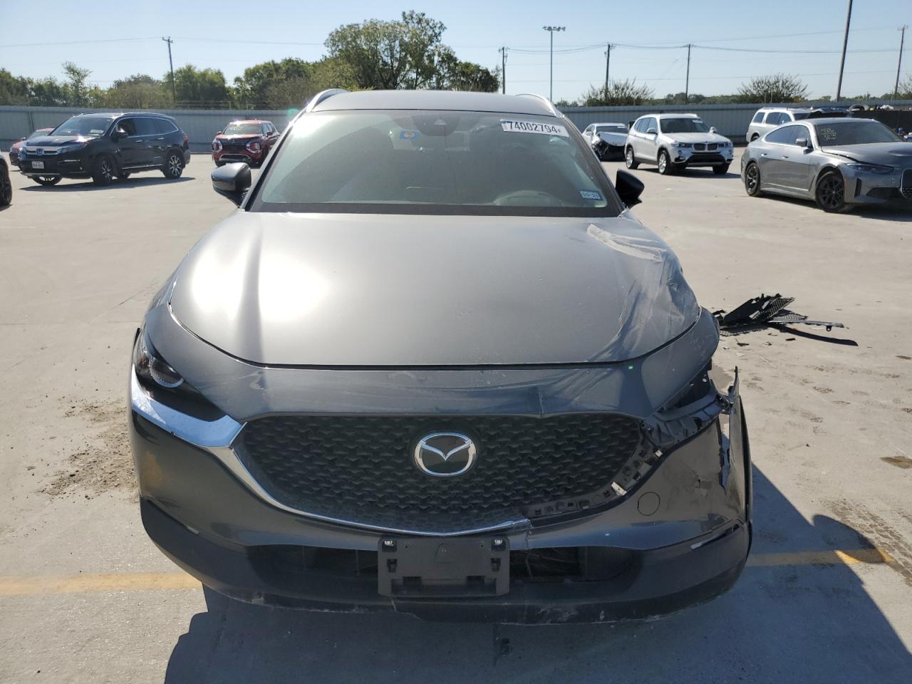 2023 Mazda CX-30 VIN 3MVDMBBMXPM560387 Copart auction photo, front end / side damage thumbnail 5