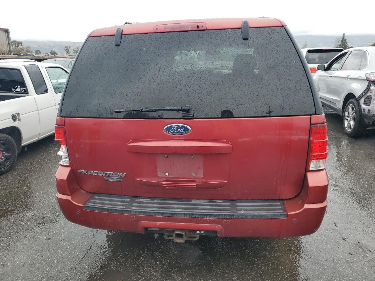 2004 Ford Expedition VIN 1FMFU18LX4LB49602 Copart auction photo, all over damage thumbnail 6