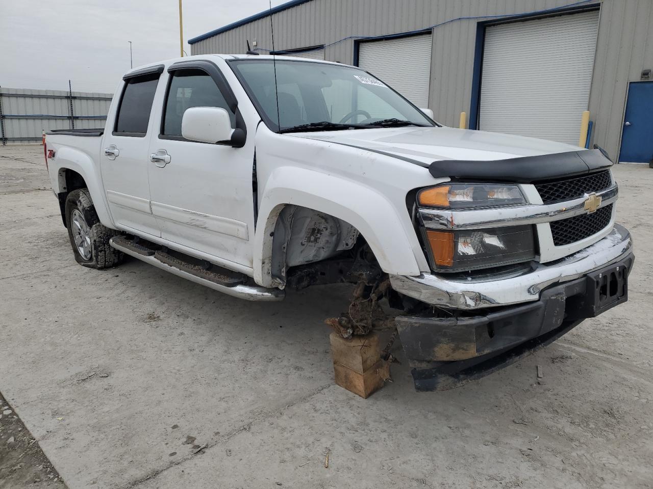 2010 Chevrolet Colorado VIN 1GCJTDDE3A8125697 Copart auction photo, side / front end damage thumbnail 4