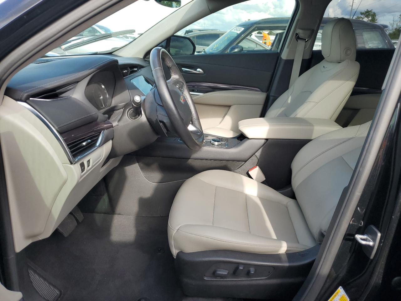 2021 Cadillac XT4 VIN 1GYAZAR40MF050786 Copart auction photo, water/flood damage thumbnail 7