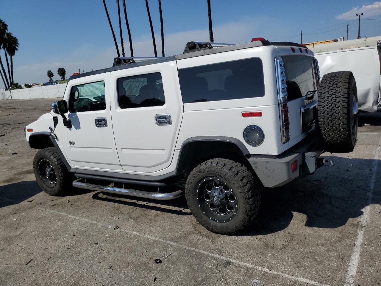 2005 Hummer H2 VIN 5GRGN23U35H132428 Copart auction photo, front end / minor dent/scratches damage thumbnail 2