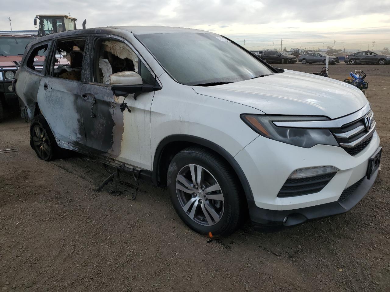 2016 Honda Pilot VIN 5FNYF6H39GB026563 Copart auction photo, burn damage thumbnail 4