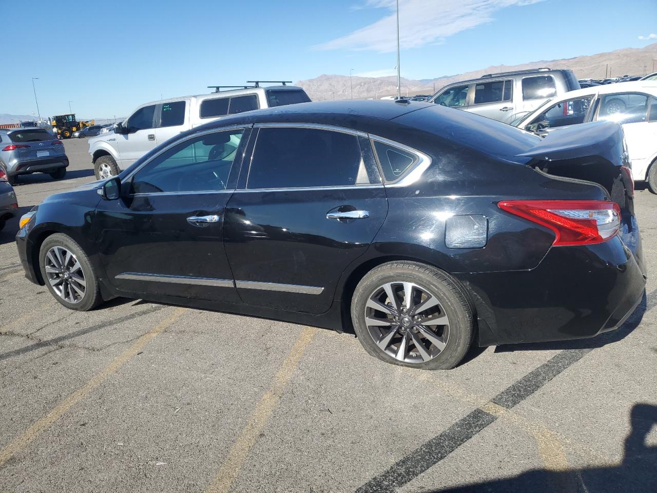 2016 Nissan Altima VIN 1N4AL3AP1GC123670 Copart auction photo, rear end damage thumbnail 2