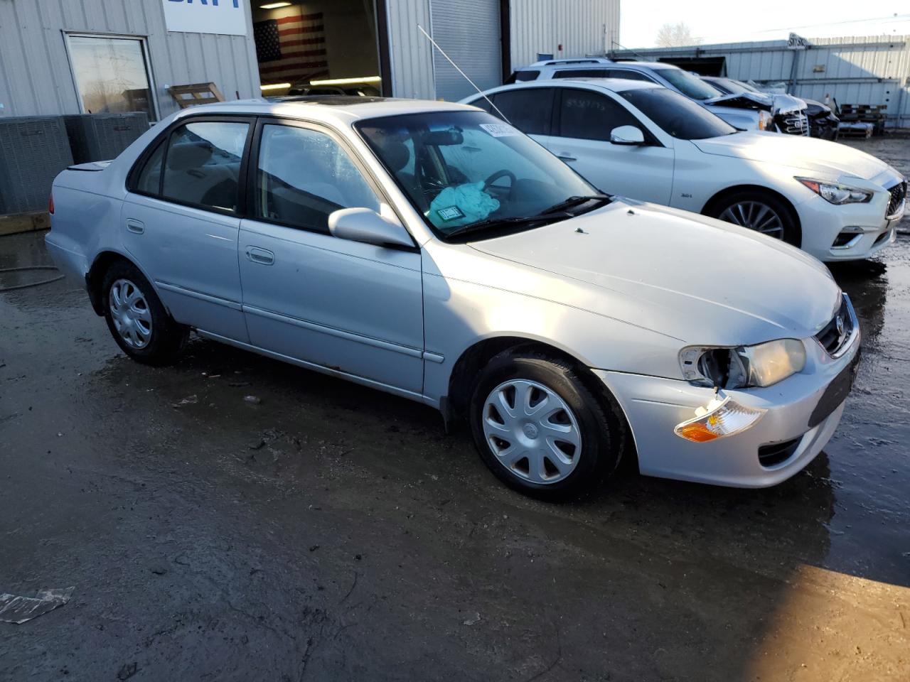 2002 Toyota Corolla VIN 1NXBR12E12Z584932 Copart auction photo, front end / rear end damage thumbnail 4