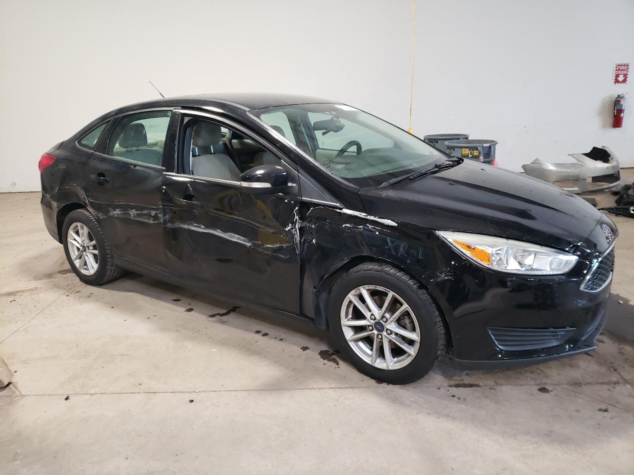 2016 Ford Focus VIN 1FADP3F29GL274304 Copart auction photo, side / front end damage thumbnail 4