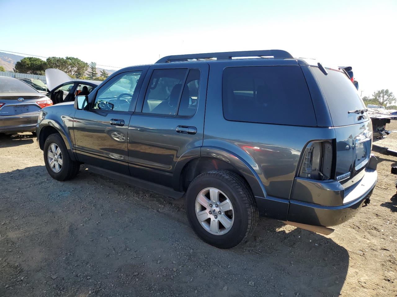 2010 Ford Explorer VIN 1FMEU7DEXAUA66814 Copart auction photo, side / rear end damage thumbnail 2