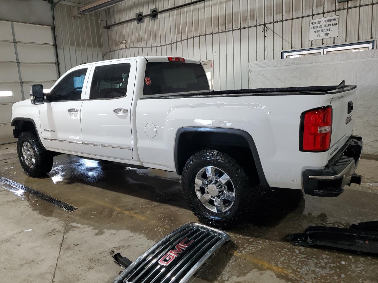 2015 GMC Sierra VIN 1GT423E83FF501983 Copart auction photo, front end / side damage thumbnail 2