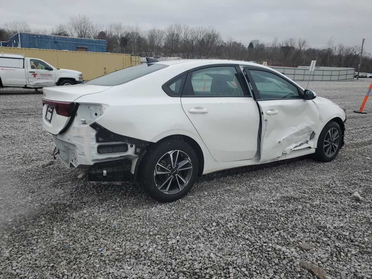 2023 KIA Forte VIN 3KPF24AD8PE670474 Copart auction photo, side / front end damage thumbnail 3