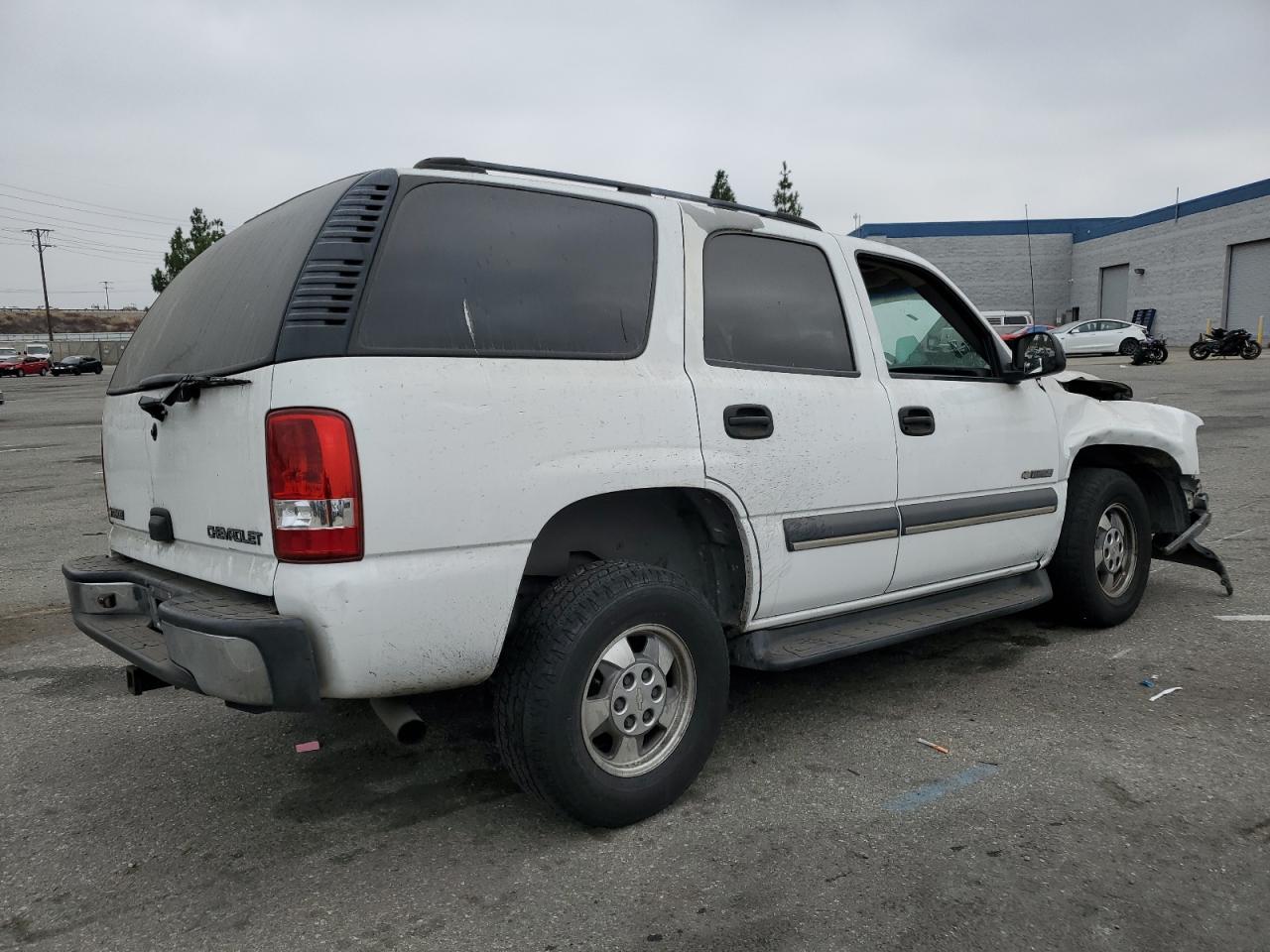 2003 Chevrolet Tahoe VIN 1GNEC13V43R227614 Copart auction photo, front end / undercarriage damage thumbnail 3