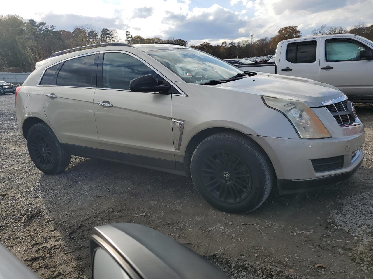 2013 Cadillac SRX VIN 3GYFNAE35DS558567 Copart auction photo, front end / minor dent/scratches damage thumbnail 4