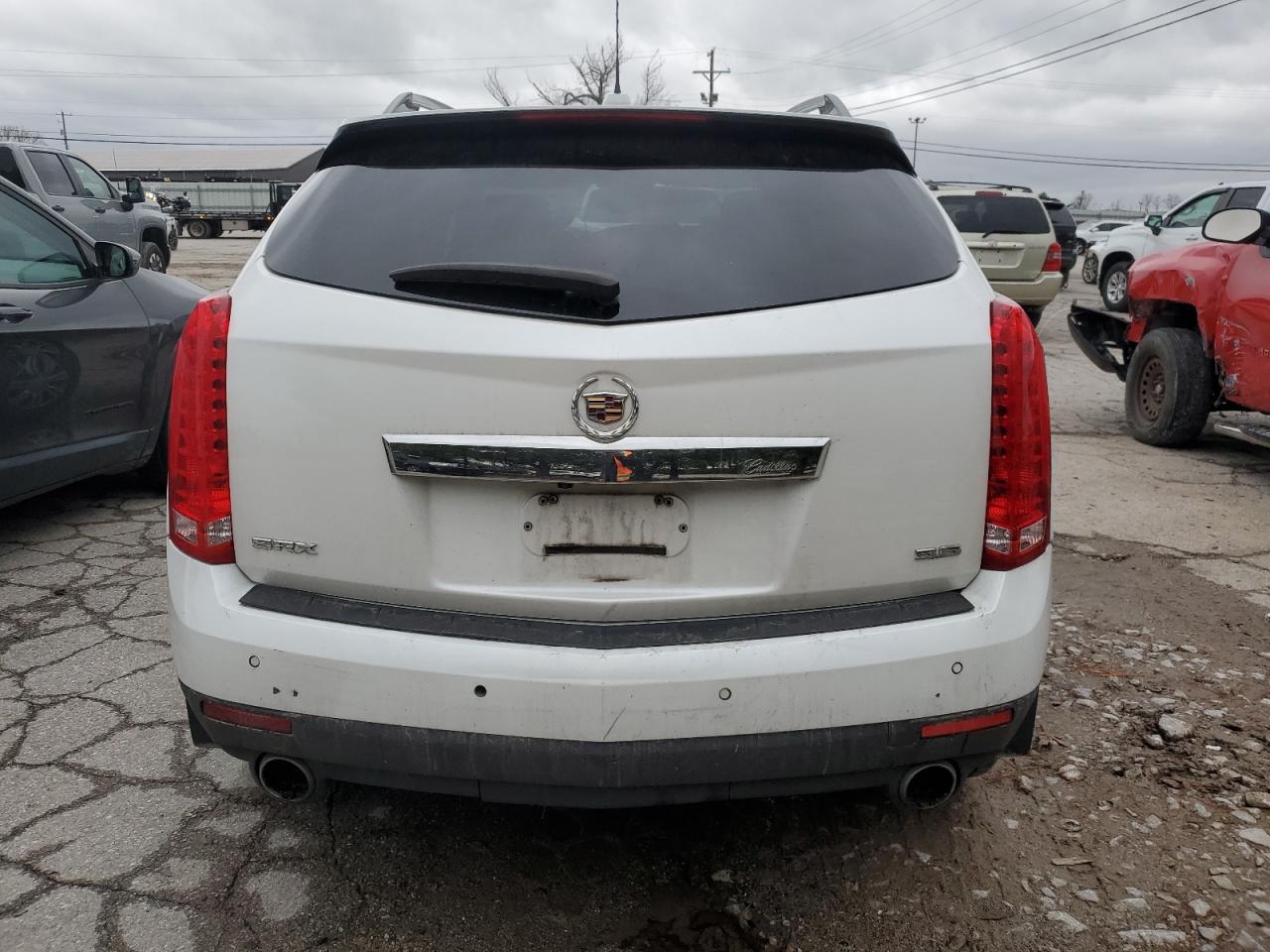 2016 Cadillac SRX VIN 3GYFNBE34GS577136 Copart auction photo, front end / frame damage damage thumbnail 6