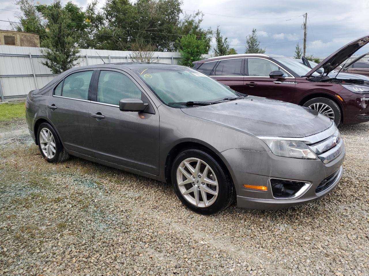 2012 Ford Fusion VIN 3FAHP0JA4CR235386 Copart auction photo, water/flood damage thumbnail 4