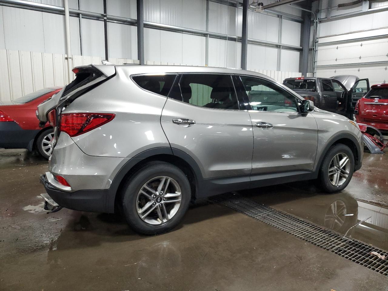 2017 Hyundai Santa Fe VIN 5NMZTDLB4HH003921 Copart auction photo, rear end damage thumbnail 3