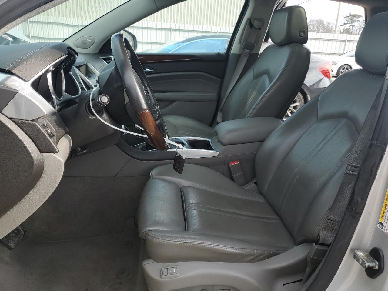 2012 Cadillac SRX VIN 3GYFNAE34CS578825 Copart auction photo, side / minor dent/scratches damage thumbnail 7