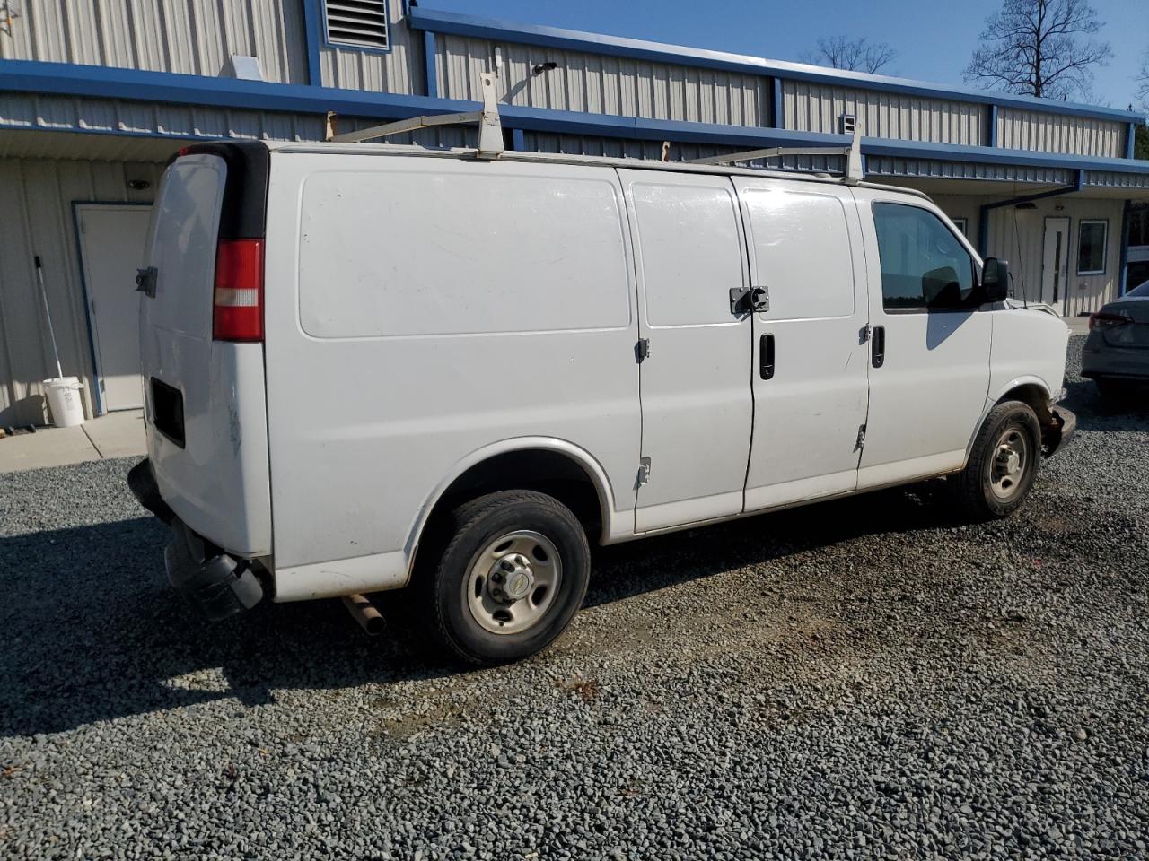 2014 Chevrolet Express VIN 1GCWGFCA0E1140371 Copart auction photo, all over damage thumbnail 3