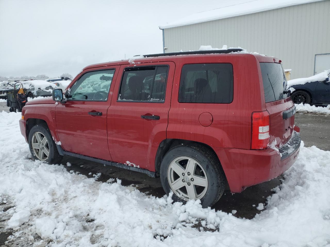 2010 Jeep Liberty (Patriot) VIN 1J4NT1GB7AD654671 Copart auction photo, side / rear end damage thumbnail 2