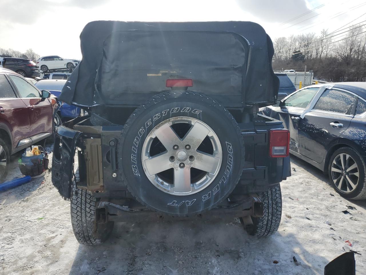 2009 Jeep Wrangler VIN 1J4GA59169L768446 Copart auction photo, rear end damage thumbnail 6