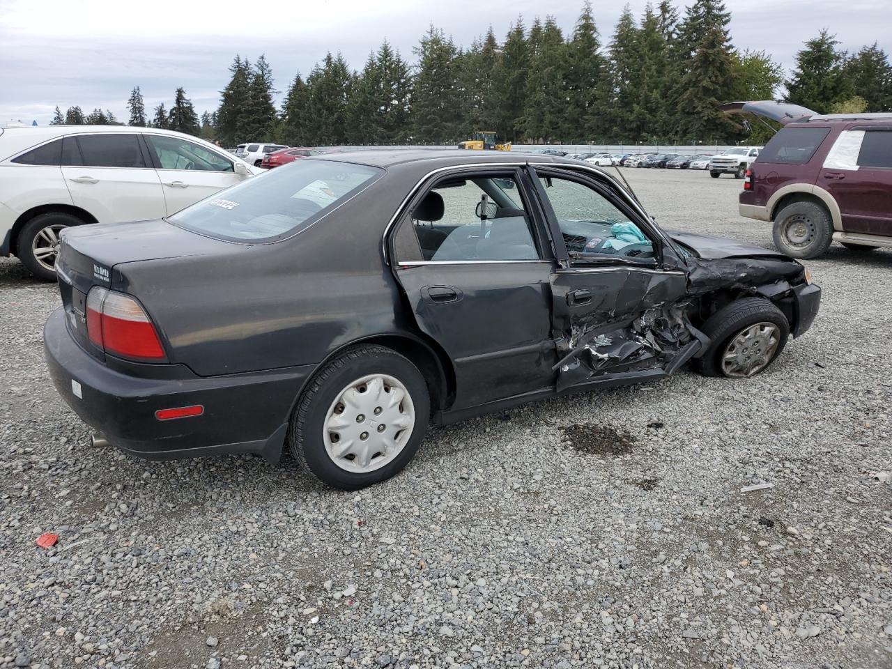 1997 Honda Accord VIN 1HGCD5634VA144072 Copart auction photo, side damage thumbnail 3