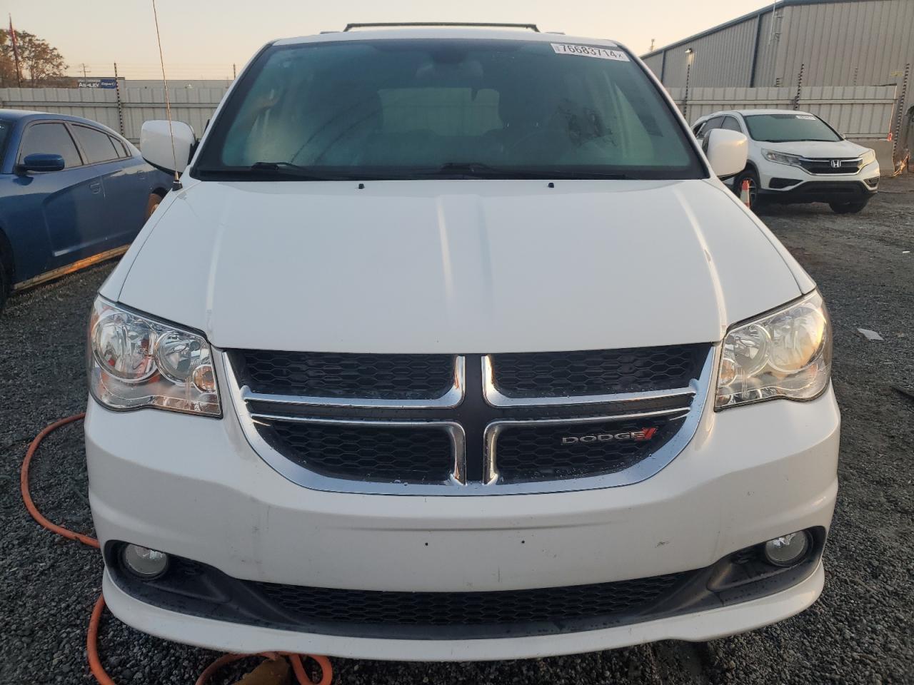 2019 Dodge Caravan VIN 2C4RDGCG5KR612233 Copart auction photo, side / minor dent/scratches damage thumbnail 5