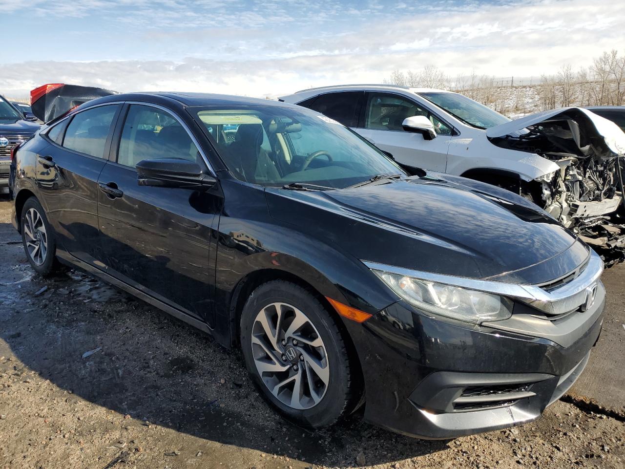 2017 Honda Civic VIN 19XFC2F75HE077340 Copart auction photo, rear end / front end damage thumbnail 4