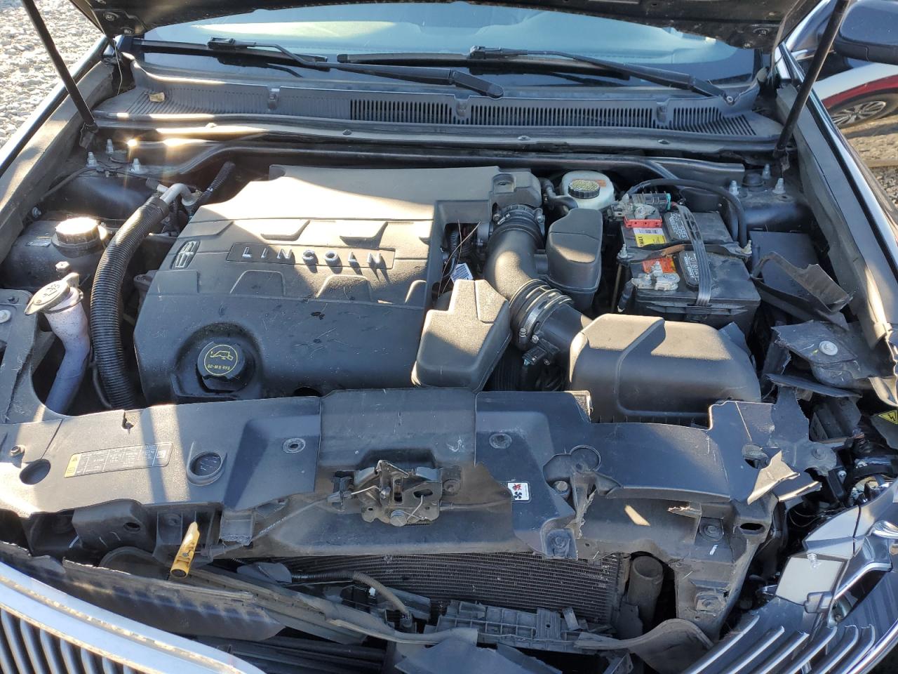 2015 Lincoln MKS VIN 1LNHL9DK7FG600858 Copart auction photo, front end damage thumbnail 11