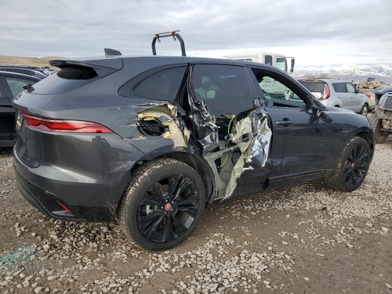 2023 Jaguar F-Pace VIN SADCJ2EX4PA710409 Copart auction photo, side damage thumbnail 3