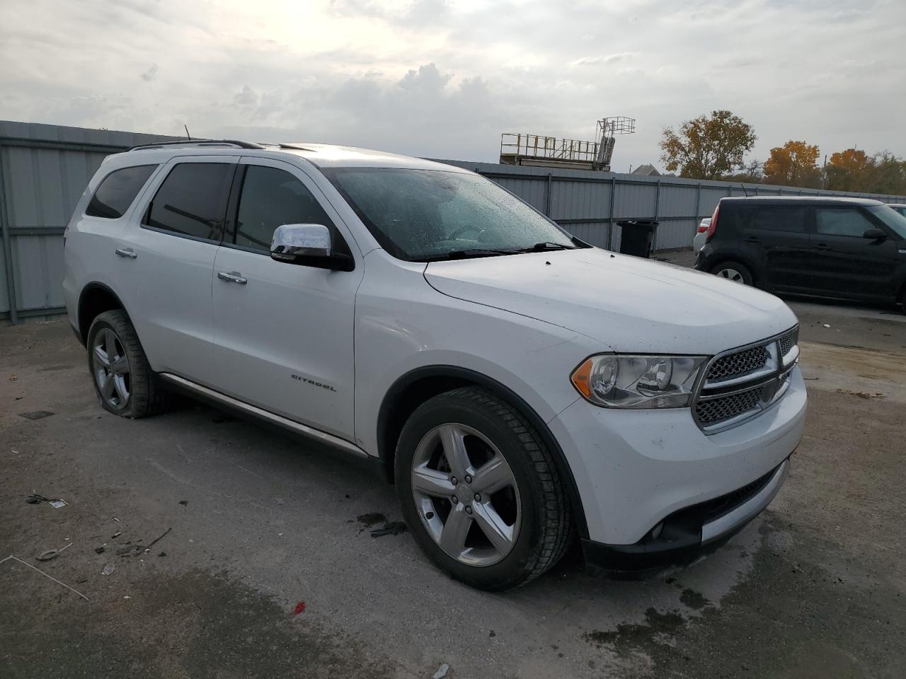 2013 Dodge Durango VIN 1C4RDJEG1DC661130 Copart auction photo, front end / side damage thumbnail 4