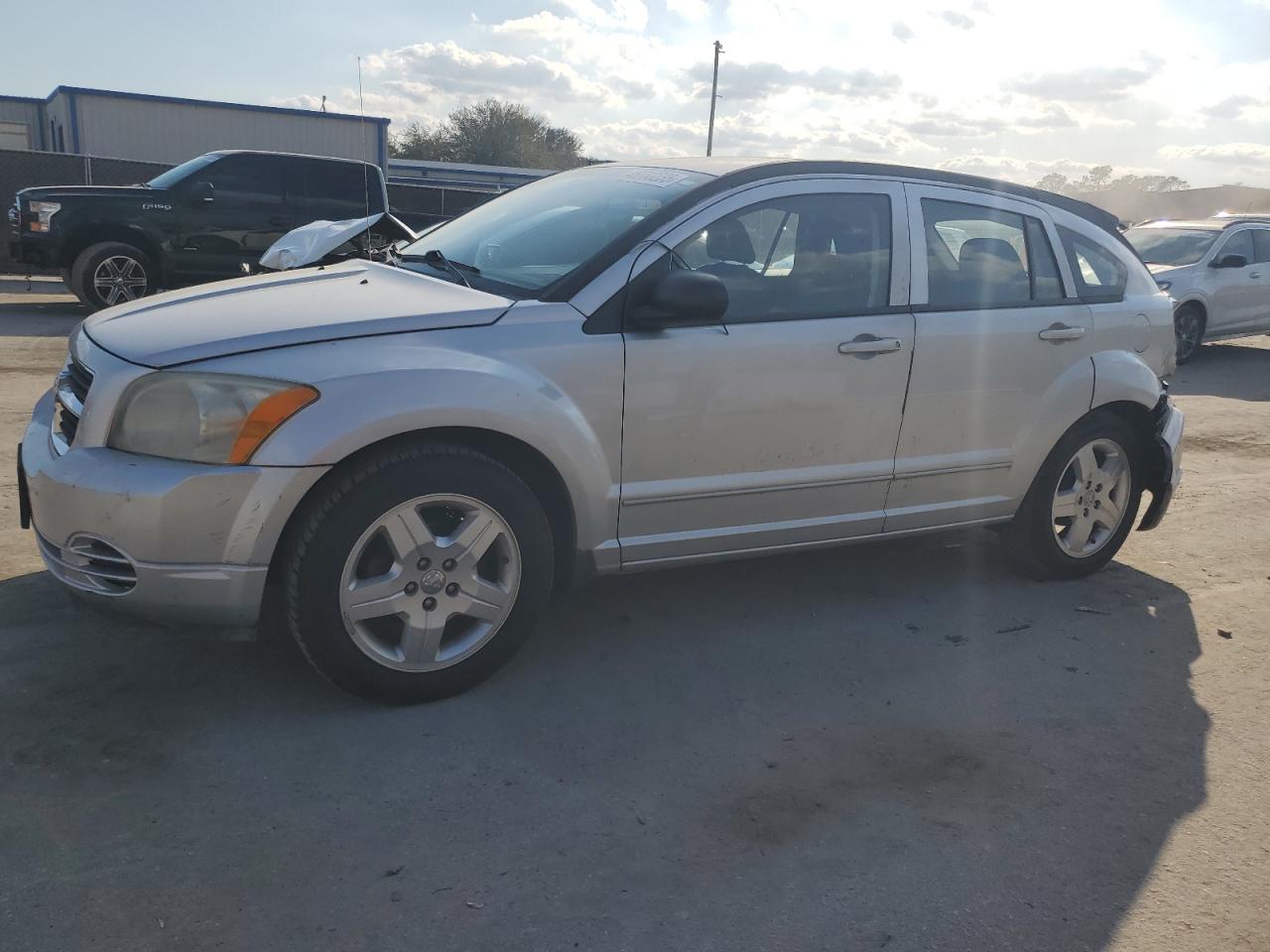 2009 Dodge Caliber VIN 1B3HB48A39D233055 - Copart auction photo