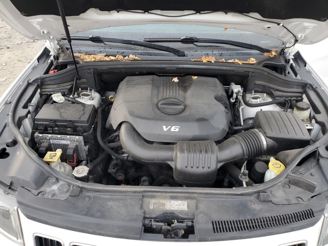 2014 Jeep Grand Cherokee VIN 1C4RJFBG8EC325387 Copart auction photo, side damage thumbnail 12