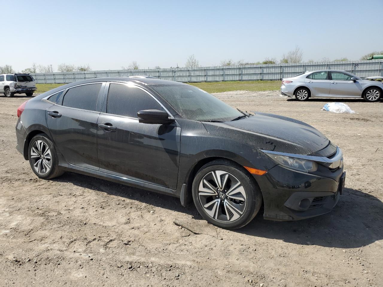 2017 Honda Civic VIN 19XFC1F79HE005390 Copart auction photo, front end / side damage thumbnail 4