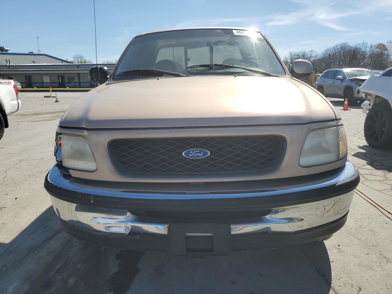1997 Ford F-150 VIN 1FTDX1762VNA54133 Copart auction photo, side damage thumbnail 5