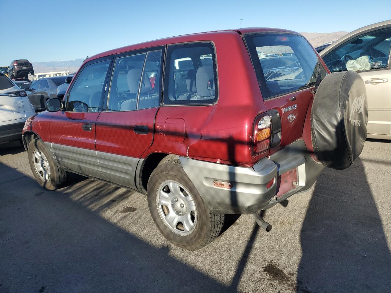 2000 Toyota RAV 4 VIN JT3GP10V5Y0042899 Copart auction photo, rear end damage thumbnail 2