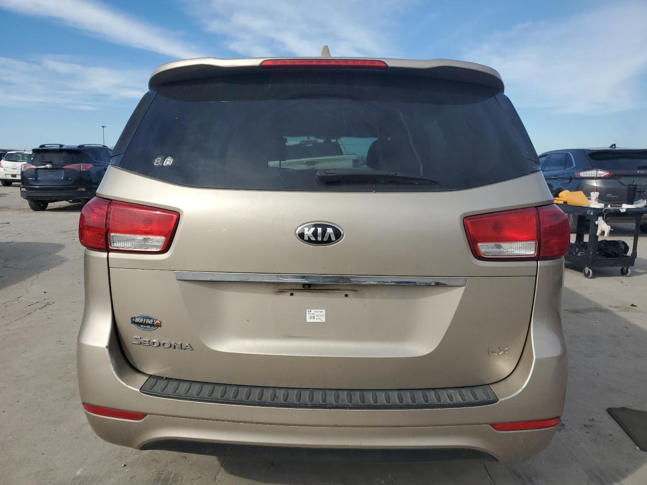 2015 KIA Sedona VIN KNDM5C1XF6040850 Copart auction photo, front end / hail damage thumbnail 6