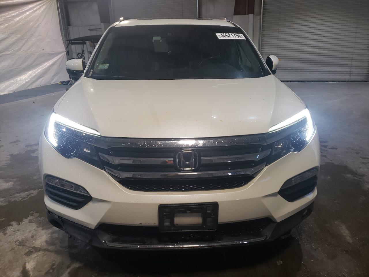 2016 Honda Pilot VIN 5FNYF6H02GB104395 Copart auction photo, undercarriage / side damage thumbnail 5