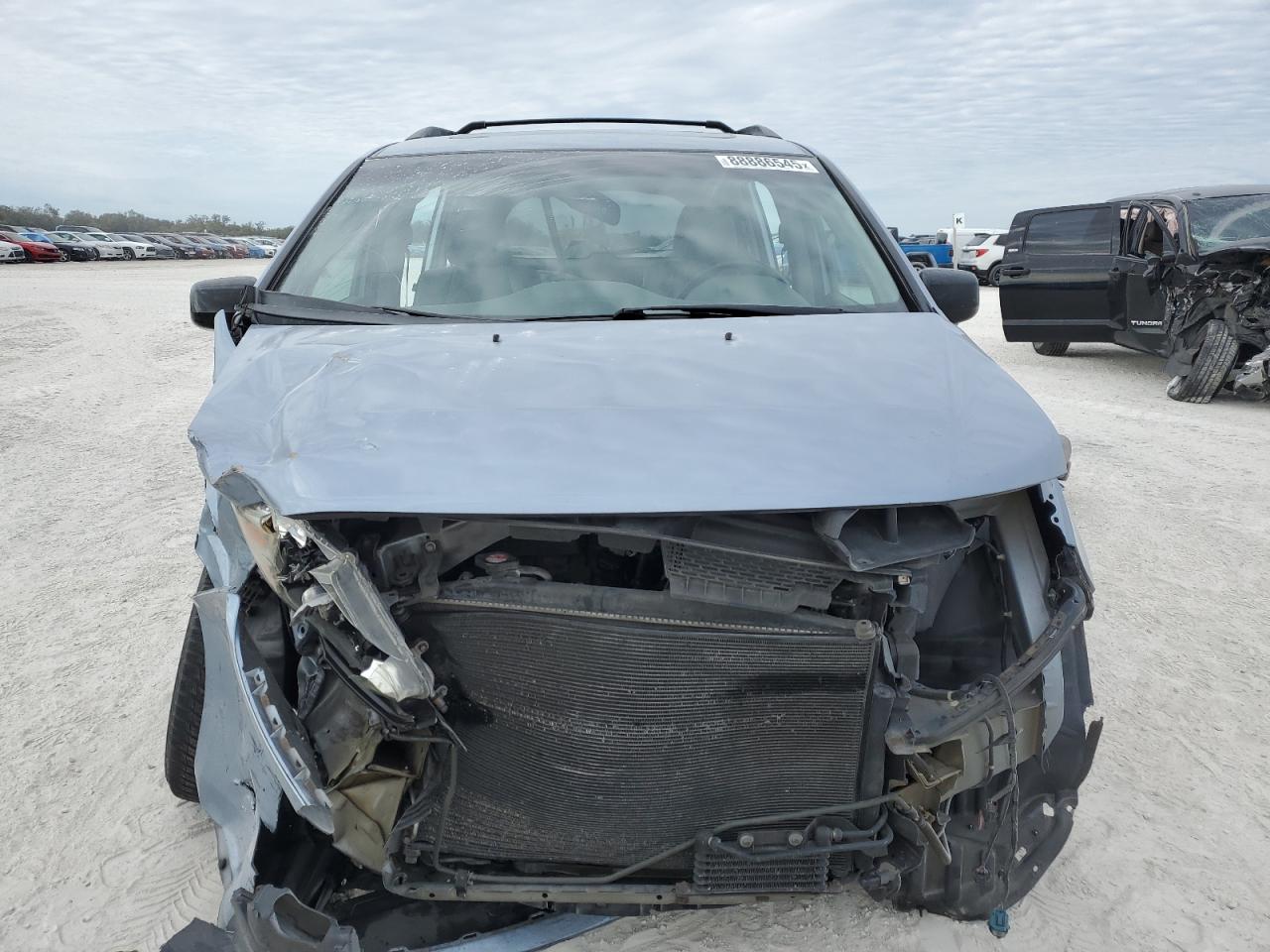 2012 Honda Odyssey VIN 5FNRL5H61CB137037 Copart auction photo, all over damage thumbnail 5