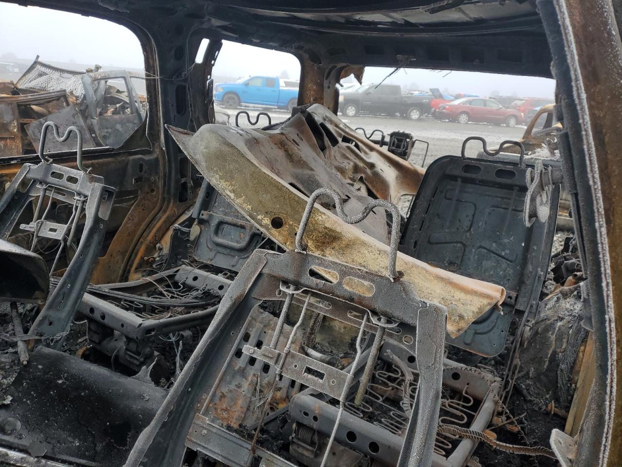2010 Cadillac Escalade VIN 1GYUKAEF9AR183825 Copart auction photo, burn damage thumbnail 10