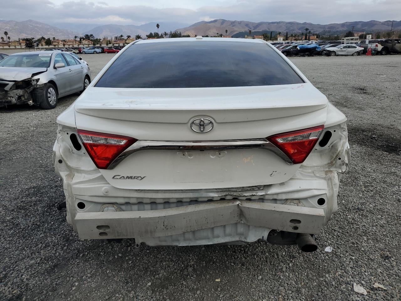 2015 Toyota Camry VIN 4T1BF1FK7FU054754 Copart auction photo, rear end damage thumbnail 6