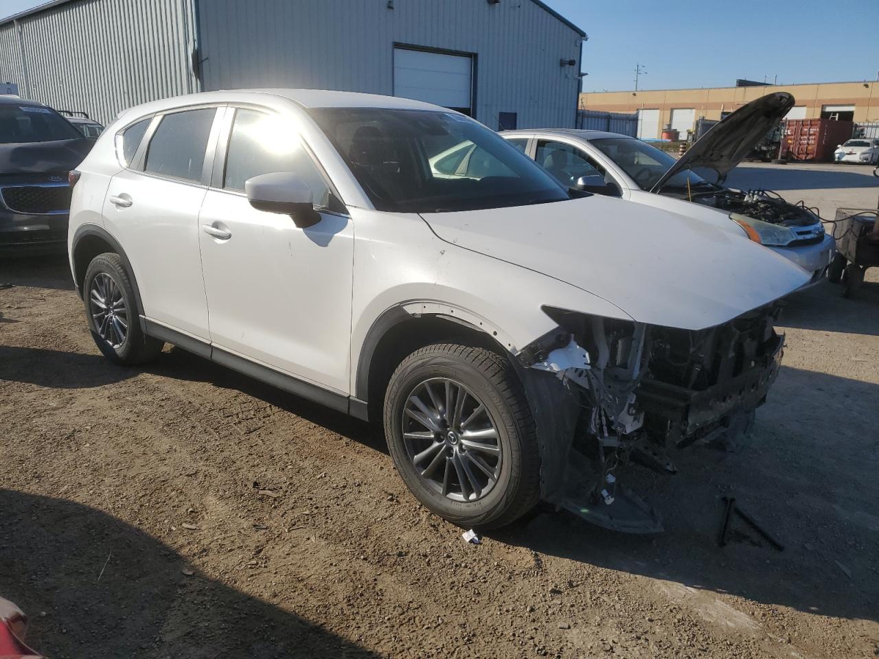 2021 Mazda CX-5 VIN JM3KFBCM3M1120481 Copart auction photo, front end / side damage thumbnail 4