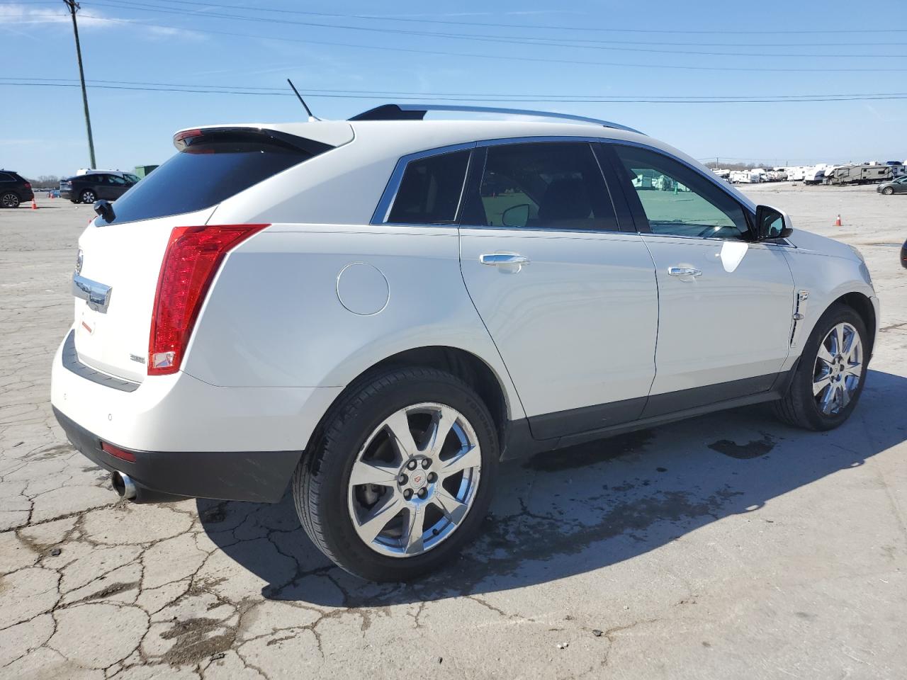 2012 Cadillac SRX VIN 3GYFNBE32CS518399 Copart auction photo, front end / minor dent/scratches damage thumbnail 3