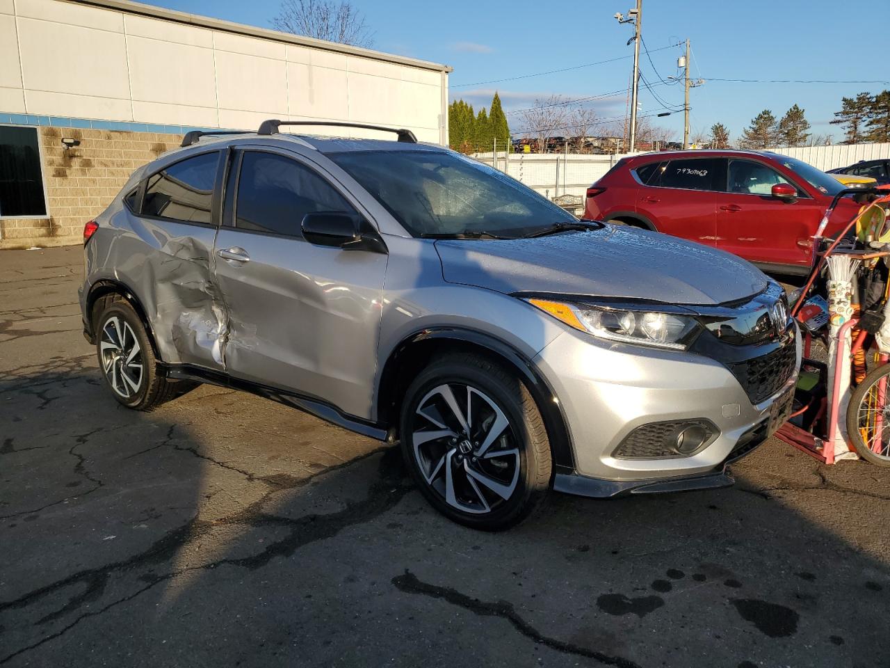 2019 Honda HR-V VIN 3CZRU6H14KG703332 Copart auction photo, side / minor dent/scratches damage thumbnail 4